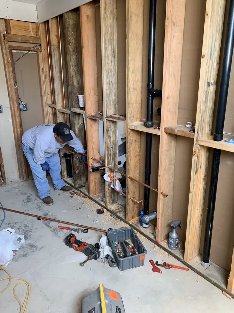 Commercial rough-in plumbing for Water Heater Replacement in Olde Town East